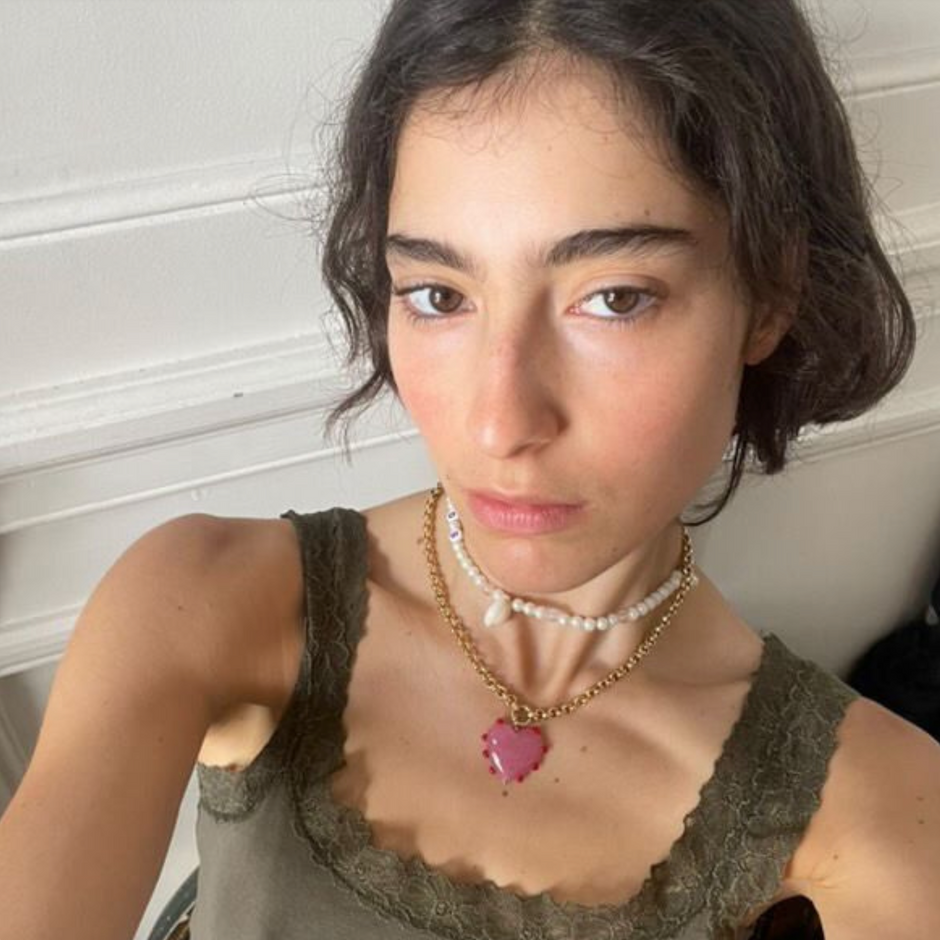 Talia Maidenberg paints our Milagros Heart